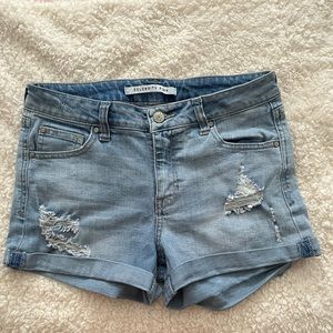 Ripped blue Jean shorts